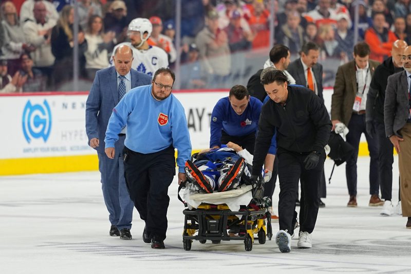 NHL defenseman leaves ice on stretcher after collision